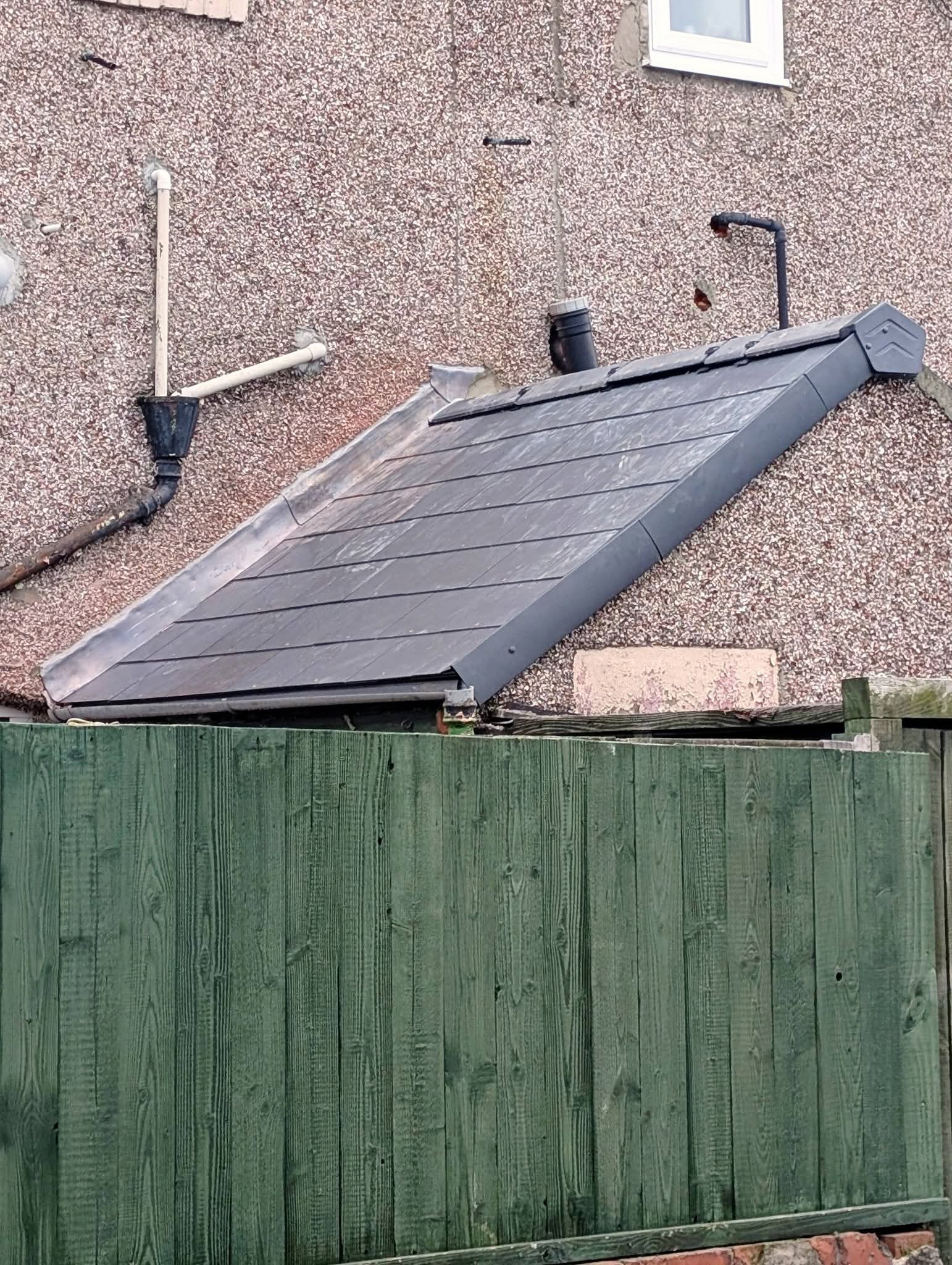 New slate roof on a brick outbuilding in Northumberland